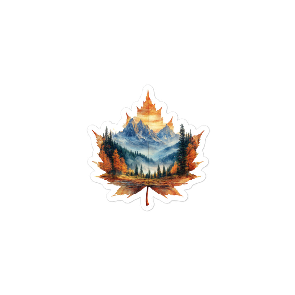 Maple leaf design with a mountain landscape inside on a white background