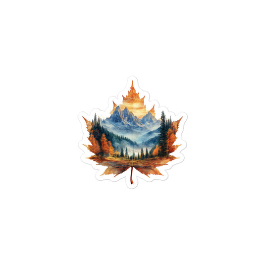 Maple leaf design with a mountain landscape inside on a white background